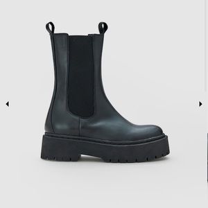 Black ‘ Gudrun’ boots from German brand Edited
